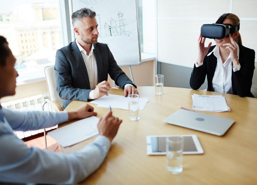 Woman with VR Goggles at Meeting Woman with VR Goggles at Meeting
